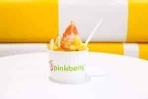Pinkberry frozen yogurt on a table