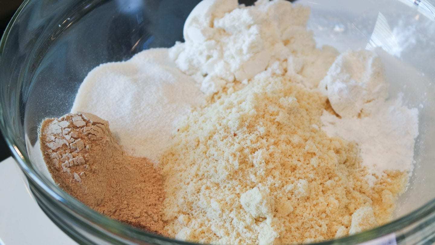 Keto cinnamon roll dough ingredients, whey protein isolate, almond flour, granulated swerve and psyllium husk.