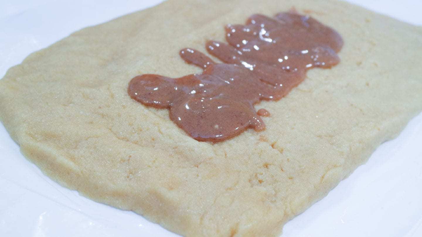 Rolled out cinnamon roll dough