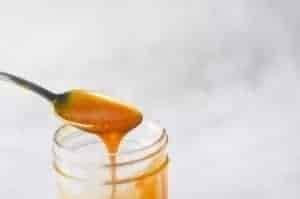 Sugar Free Caramel Sauce drizzled into mason jar