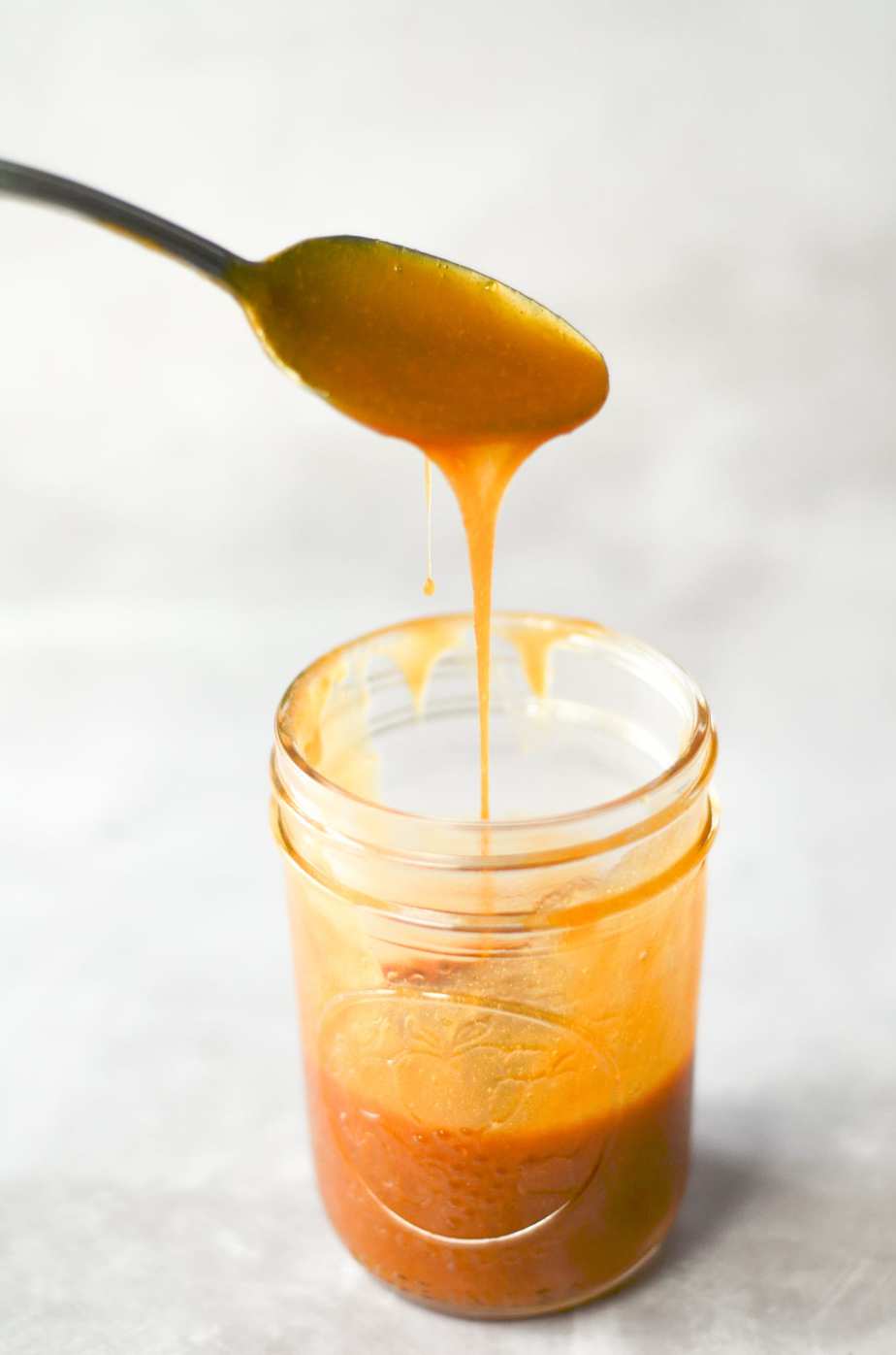 Salted Caramel being drizzled into a jar