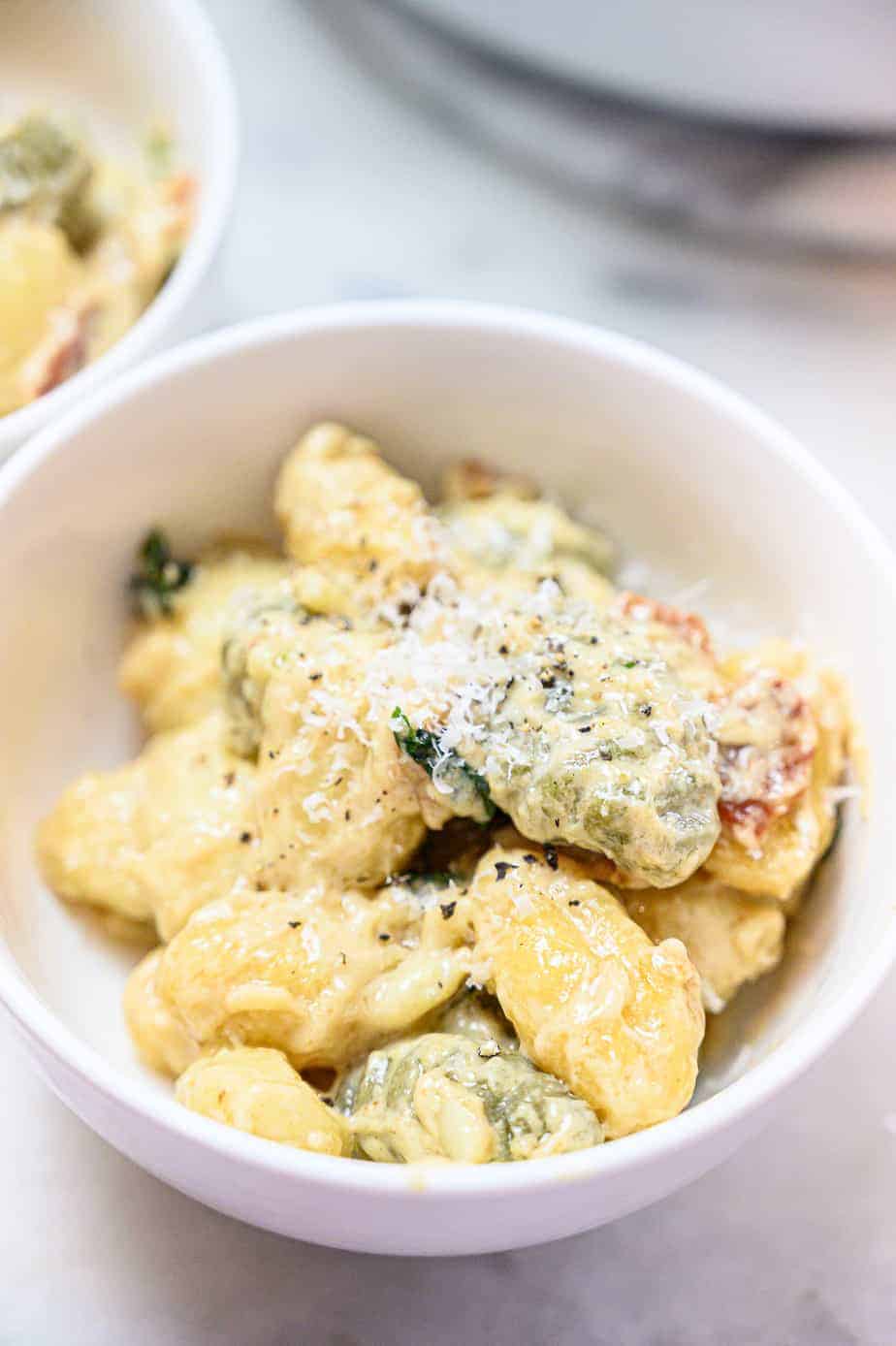 gnocchi pasta in white bowl
