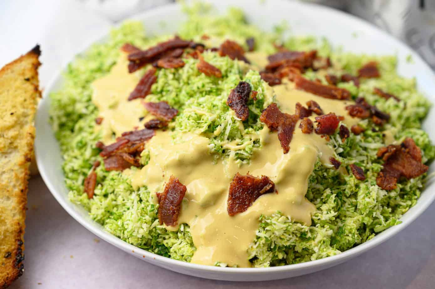 brussel sprout salad with bacon and garlic bread