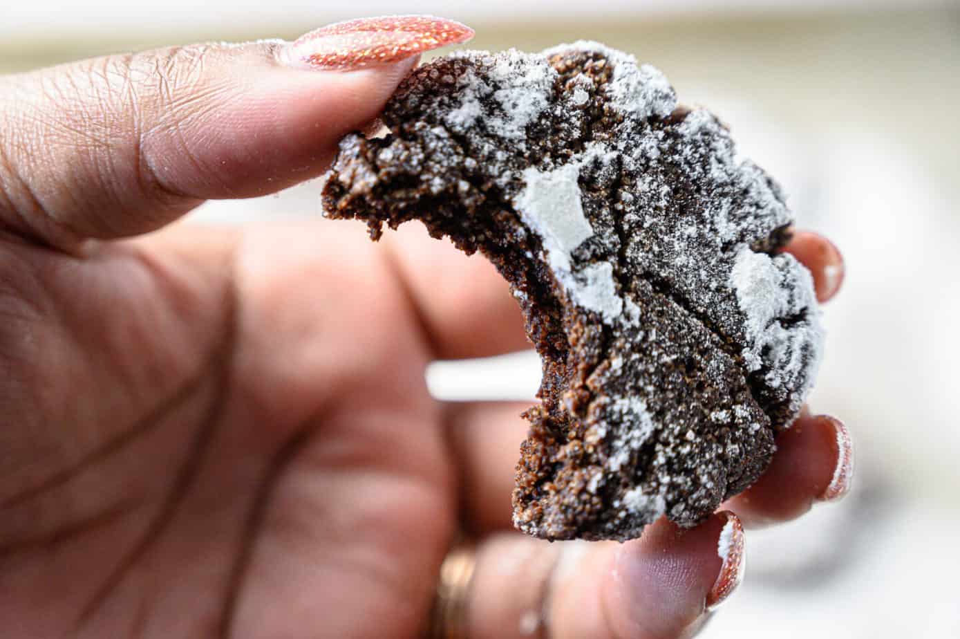 Holding crinkle cookies up to camera 