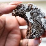 holding a crinkle cookie