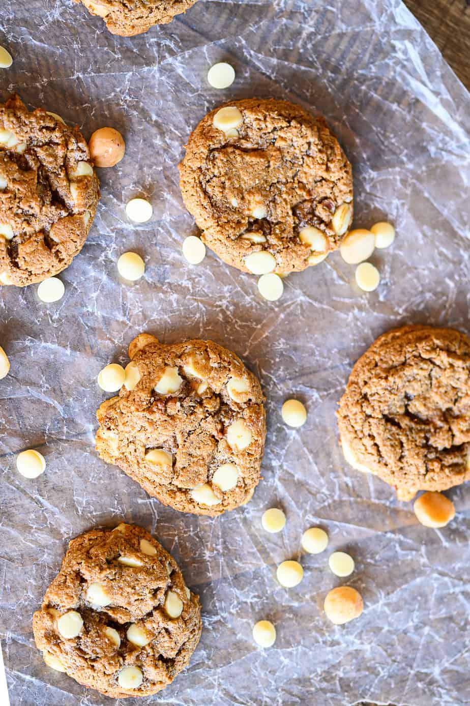 white chocolate macadamia nut cookies on wax paper