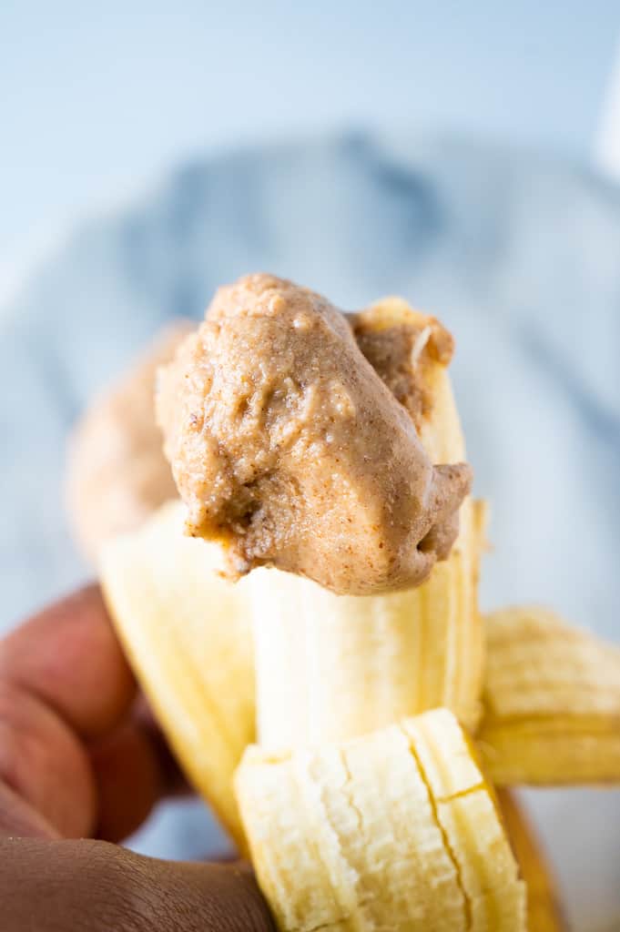 Almond butter spread on a banana