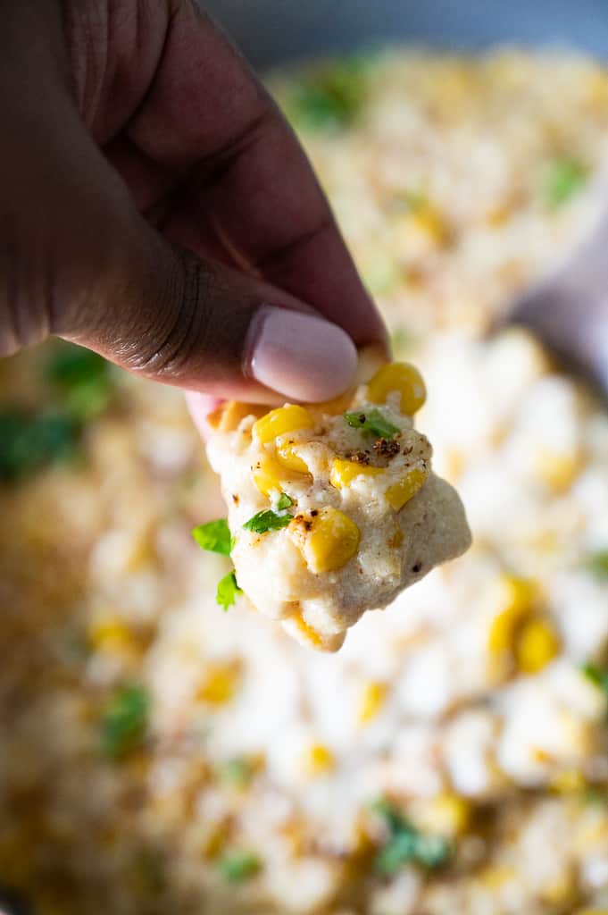 Elote scooped with a chip.