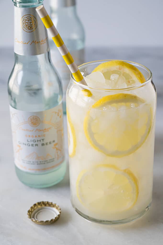 Cocktail with lemon and ginger beer.