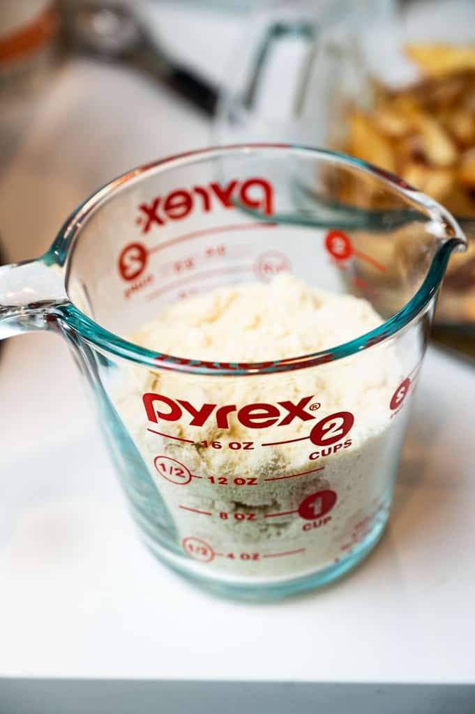Almond flour in a measuring cup