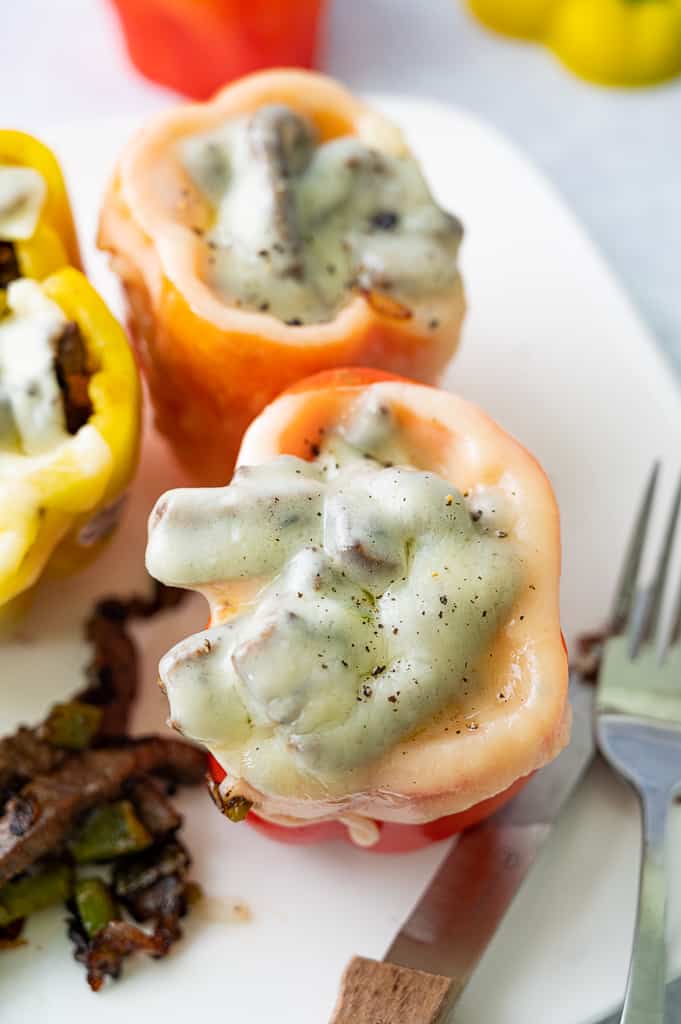 Red bell pepper with cheese on top.