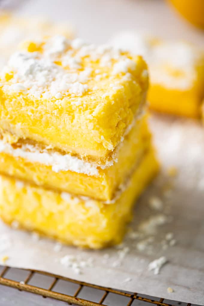 Lemon bars stacked on corner shot