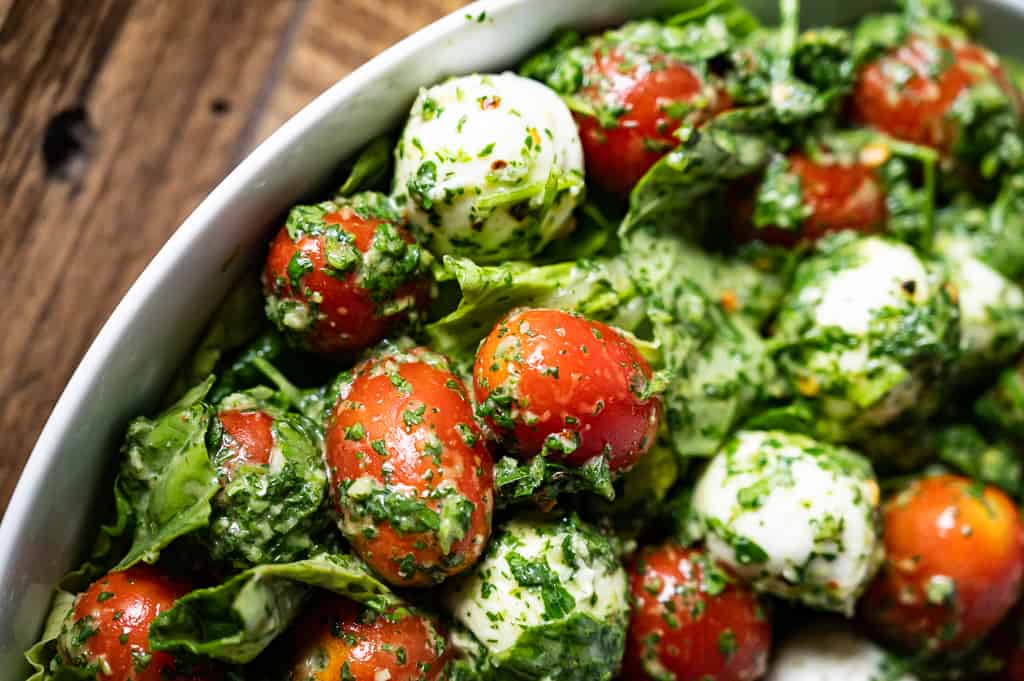Mozarella, tomatoes and basil together.