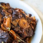 Jamaican oxtail in a bowl close up
