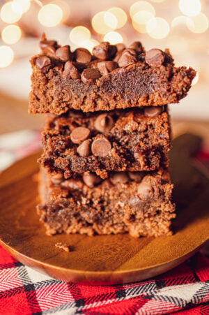 fudgy low carb brownies stacked on top of each other