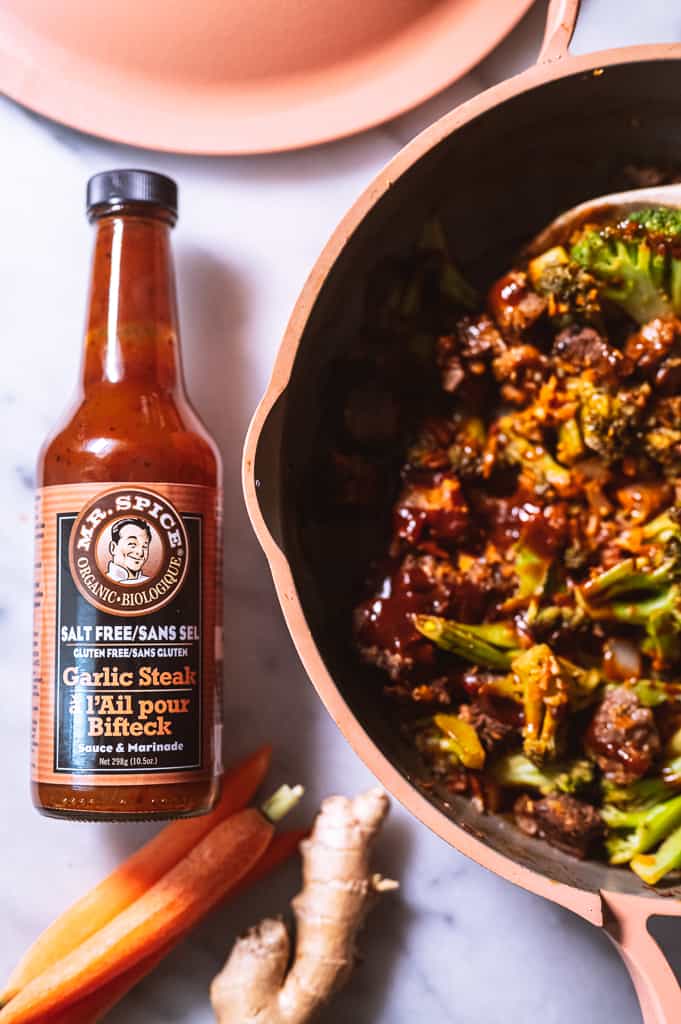 Mr. Spice bottle next to pan of beef and broccoli