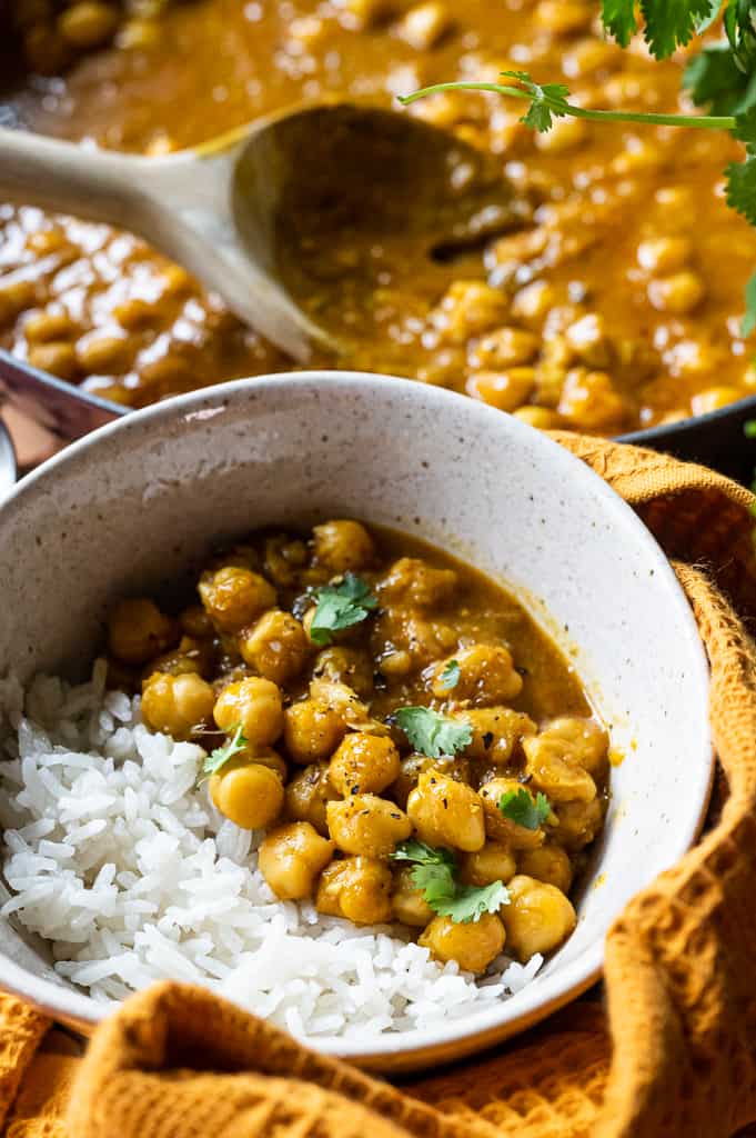 Vegan chickpea curry in a bowl with rice