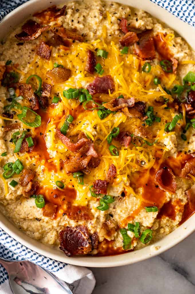 Low Carb Cauliflower Grits with bacon, green onions and cheese. 