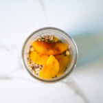 oats and peaches combined together for overnight oats