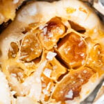 close up photo of roasted garlic with salt
