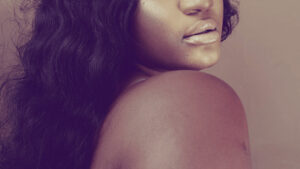 woman cropped to shoulder and lips