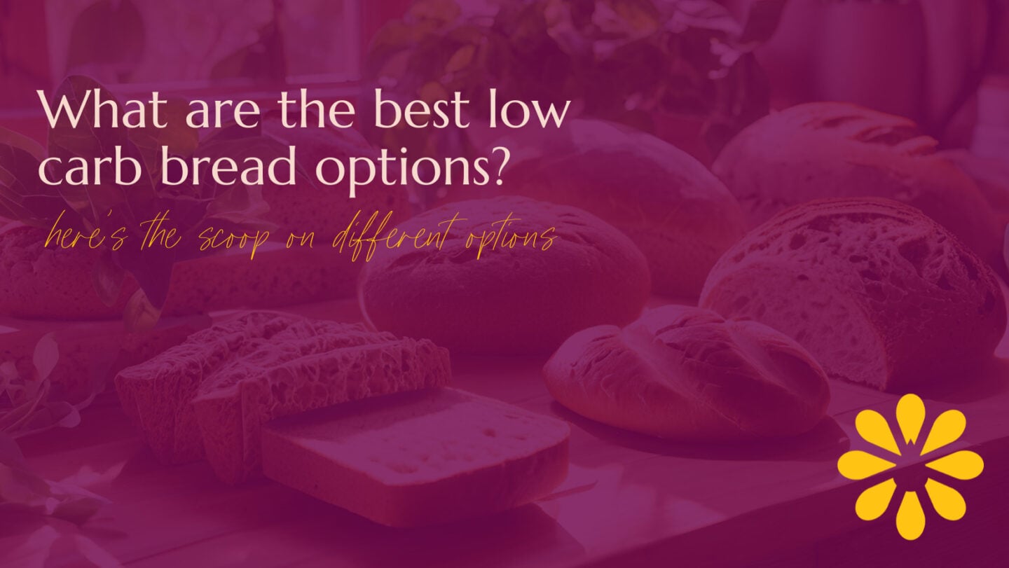 Purple graphic with "what are the best low carb bread options" as the title with a photo of different kinds of breads in the background.