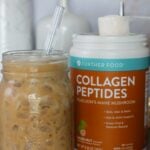 Further Foods Hazelnut Collagen Peptides and coffee drink in a mason jar