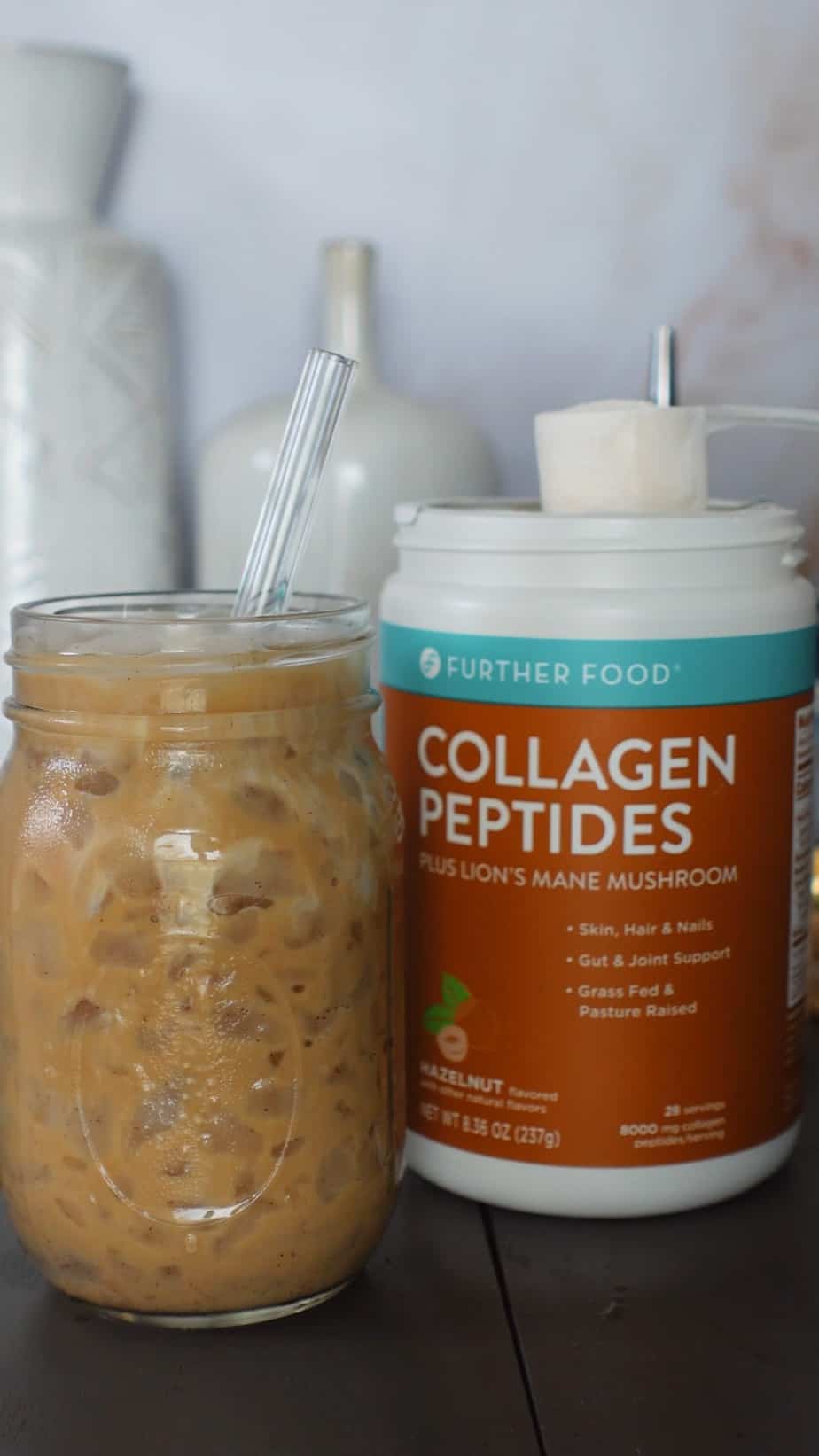 Further Foods Hazelnut Collagen Peptides and coffee drink in a mason jar