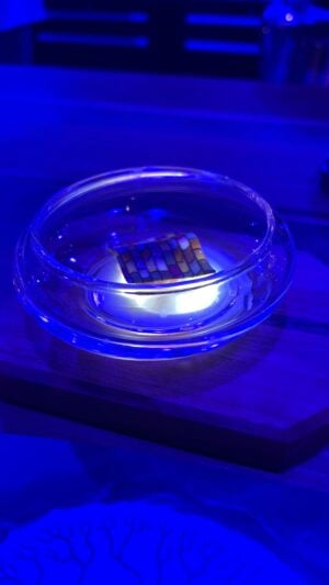 stained glass pasta in a bowl lit from below