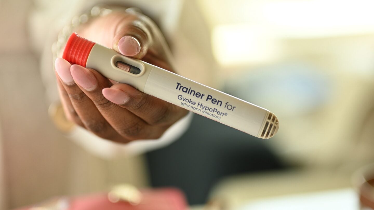 Holding Gvoke Hypopen in hand